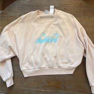 Pink Levi’s sweatshirt